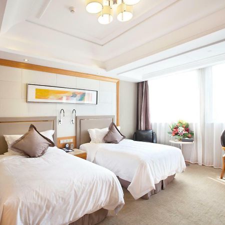 Friend Hotel Shanghái Habitación foto