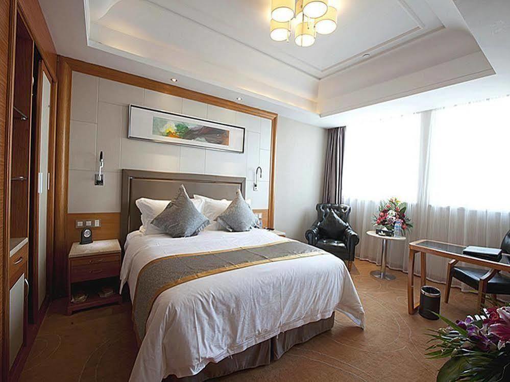 Friend Hotel Shanghái Habitación foto